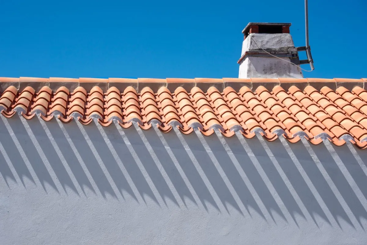 Roof ridge line and chimney on a home in New Braunfels, TX